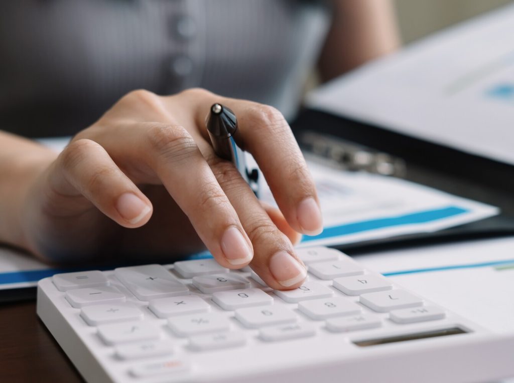 person using a calculator
