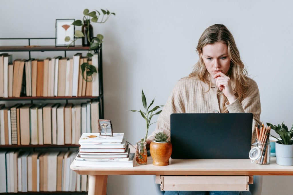 woman proofreader looking for grammar errors